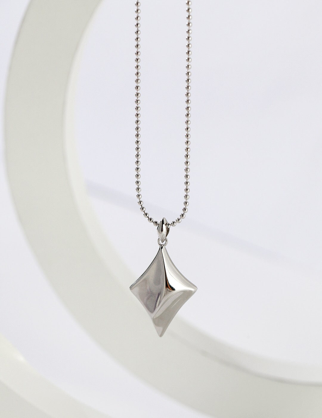 Four-Pointed Star Charm Necklace