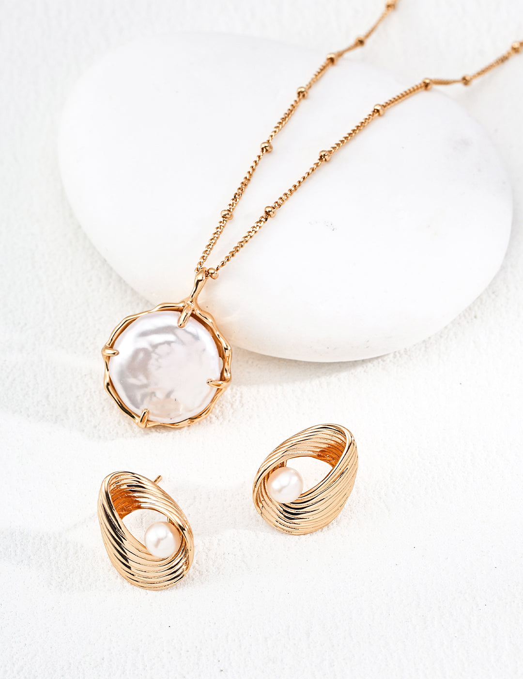 Sculpted Halo Pearl Earrings